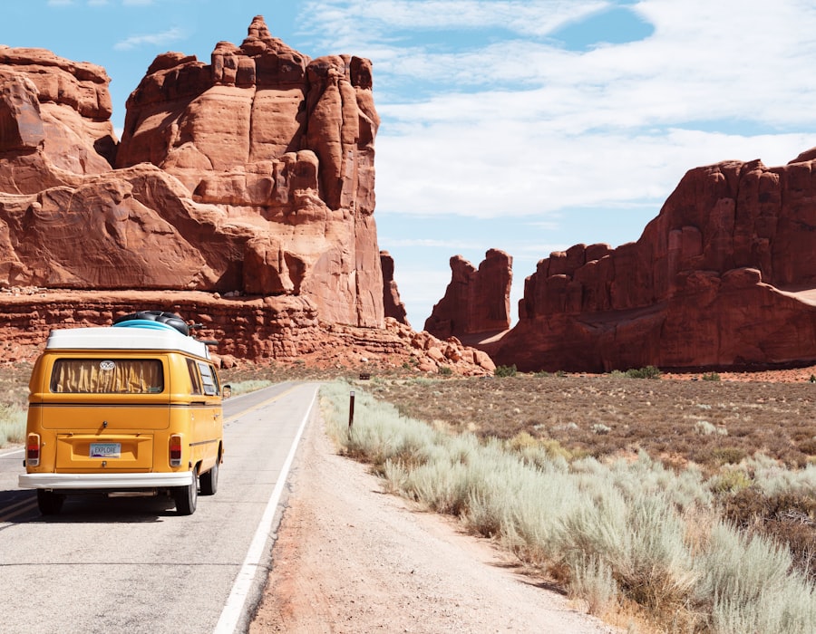 Yellow van driving down an open desert highway, evoking a confident next coverage choice